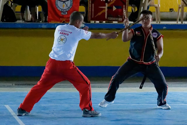 Filipino Martial Arts Instructor Demonstrates Stick Fighting Techniques  Stock Photo - Image of astig, outdoor: 109278684